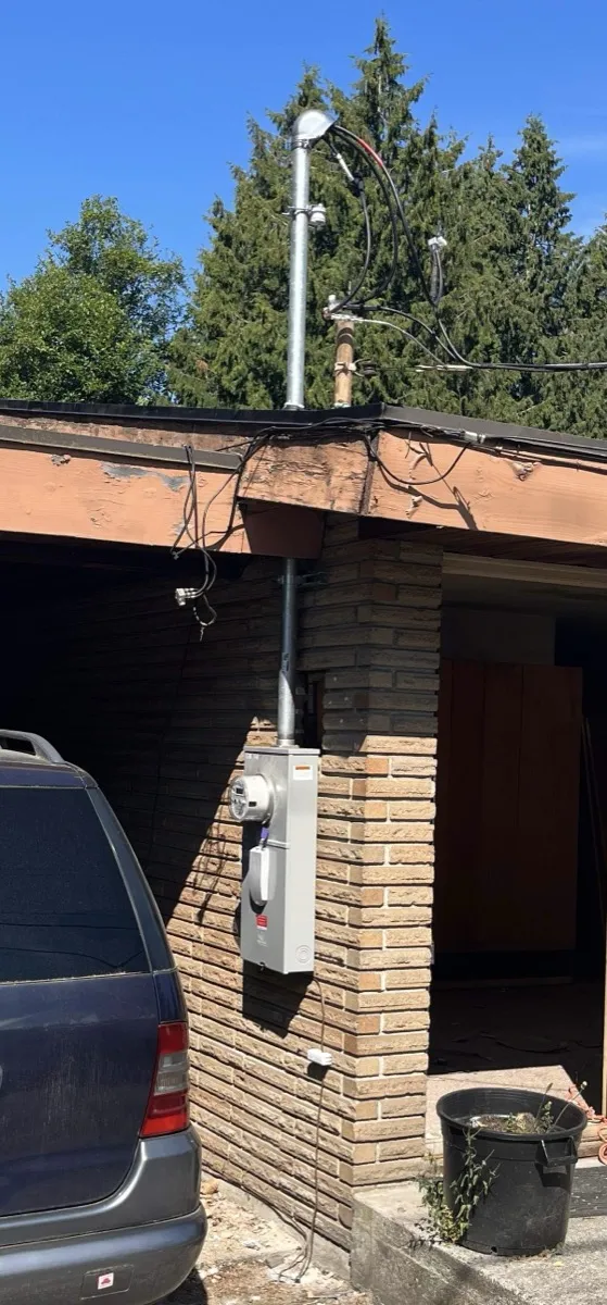 After: new meter and service riser installed by Aztec Electric