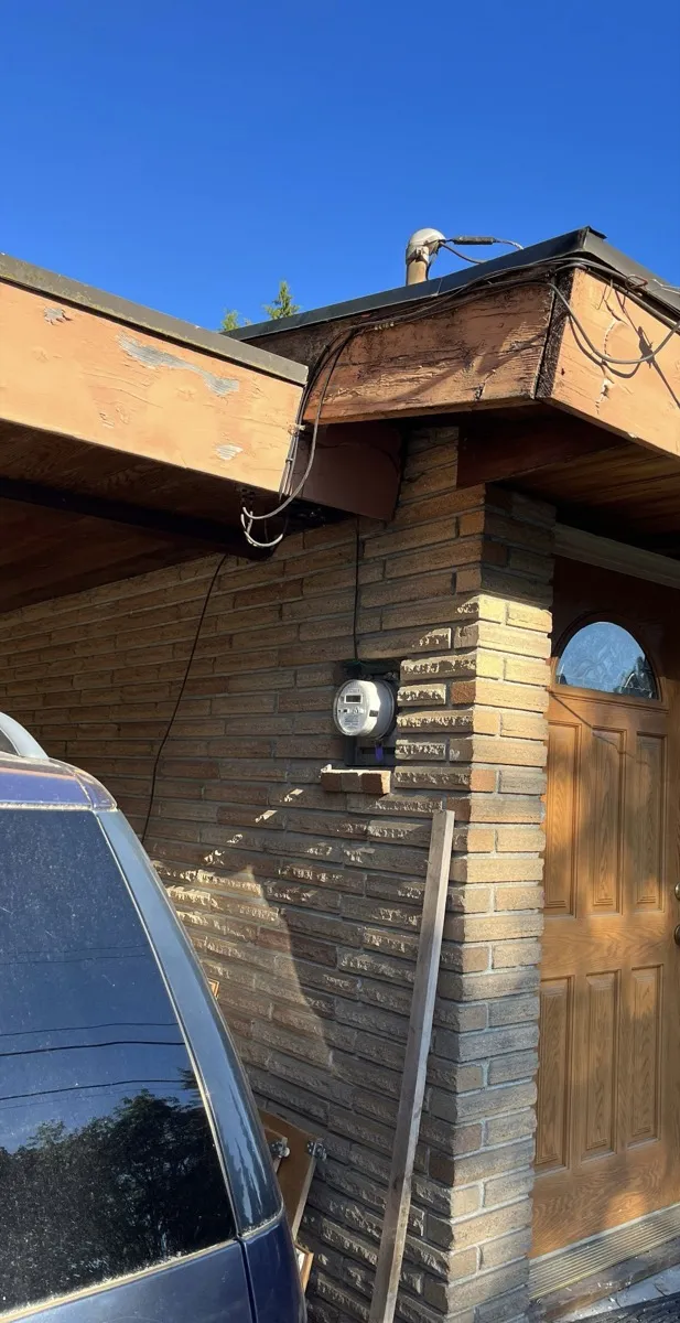 Before: exposed wiring and old service riser